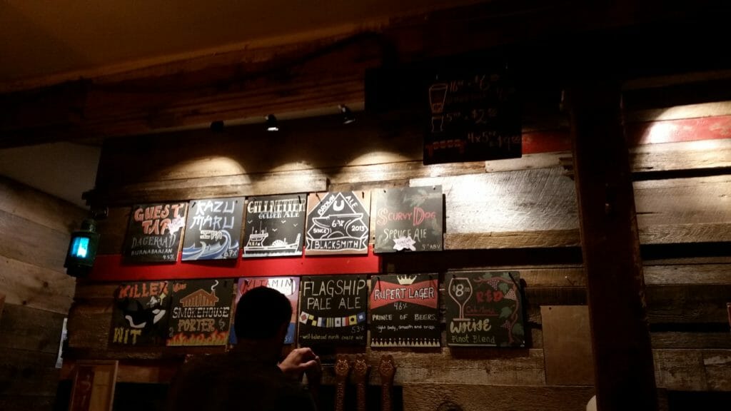image of signs describing beers on tap at Wheelhouse Brewing in Prince Rupert, BC