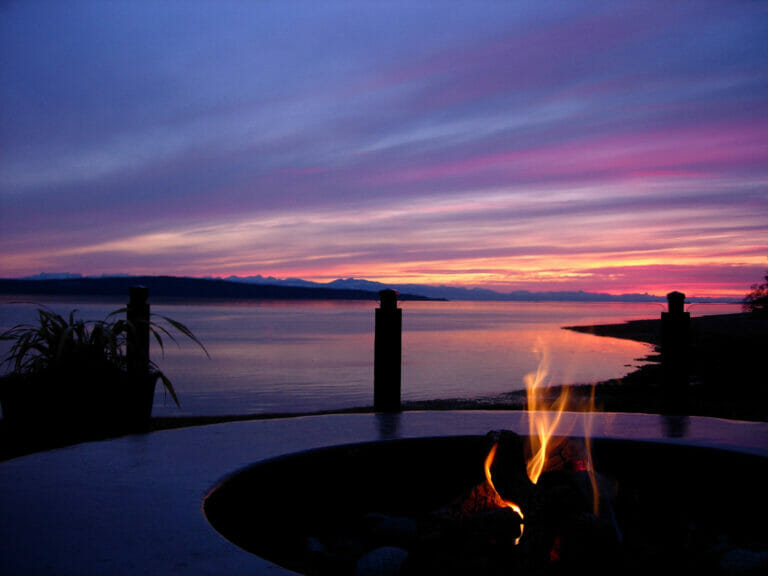 Ocean view of a sunset at Beach Gardens Hotel in Powell River